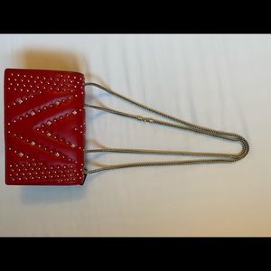 Red studded MCM small shoulder bag